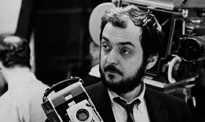 Stanley Kubrick holding and old camera